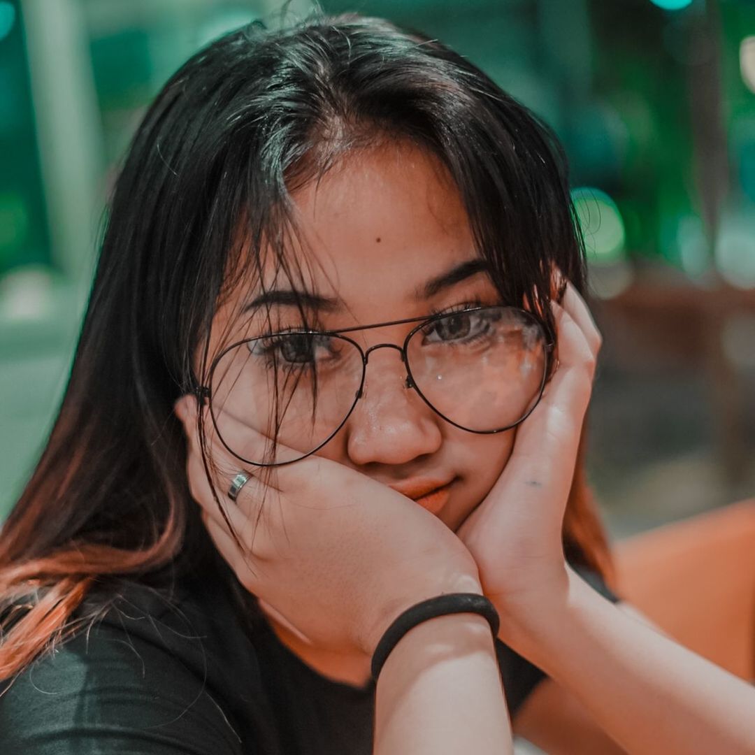 portrait, one person, female, eyeglasses, glasses, child, childhood, person, women, emotion, headshot, teenager, adult, human eye, human face, smiling, skin, lifestyles, close-up, black hair, hairstyle, vision care, human head, looking at camera, focus on foreground, hand, happiness, cute, human hair, photo shoot