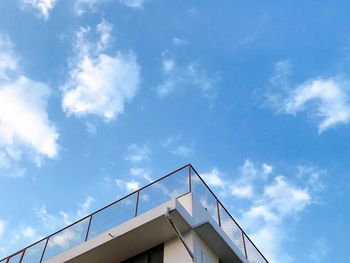 Low angle view of building against blue sky