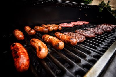 Close-up of meat on barbecue grill