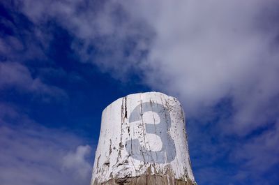 Low angle view of text against sky