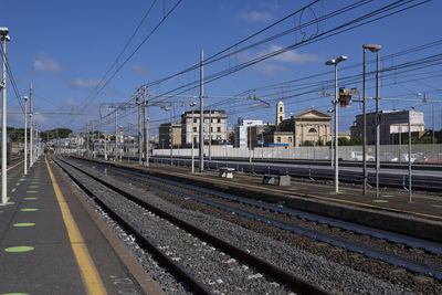 Railroad station platform against sky