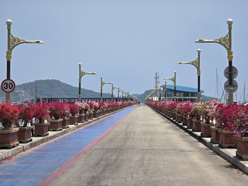 Empty road against clear sky