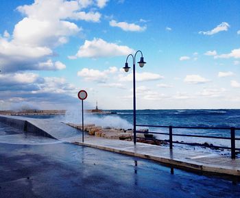 Scenic view of sea against cloudy sky