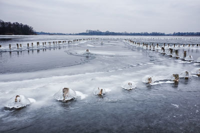 Scenic view of frozen lake against sky