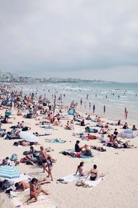 High angle view of people on beach against sky