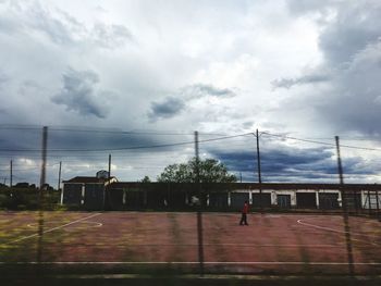 Built structure against cloudy sky