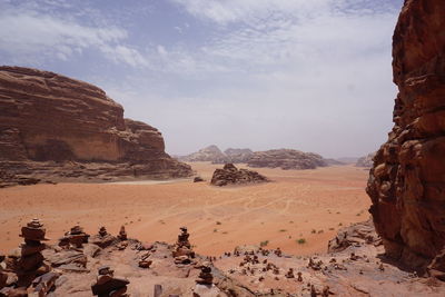 Panoramic view of desert against sky