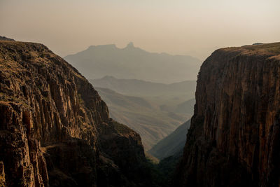 Scenic view of mountains against sky during sunset