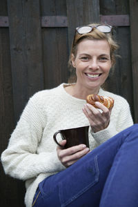 Portrait of mature woman during coffee break