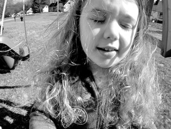 Portrait of happy woman in park