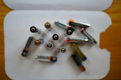 High angle view of batteries on table