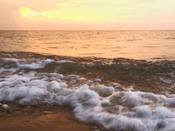 Scenic view of sea at sunset
