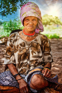 Portrait of a man sitting outdoors