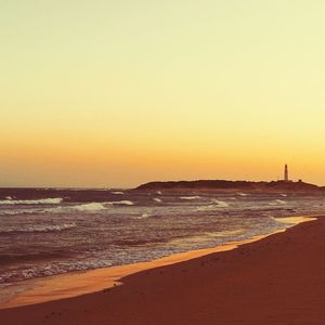 Scenic view of sea at sunset