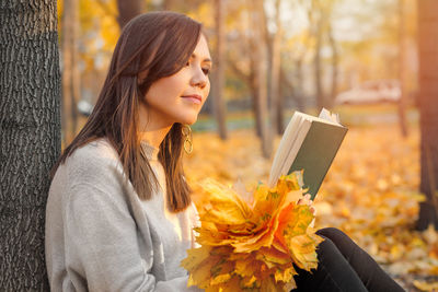 Young woman using mobile phone