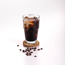 Close-up of coffee cup against white background