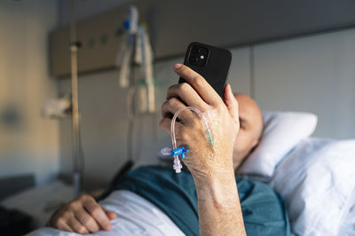 Patient resting on bed while resting in hospital