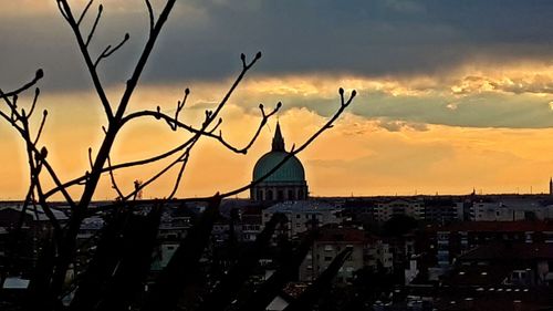 View of buildings at sunset