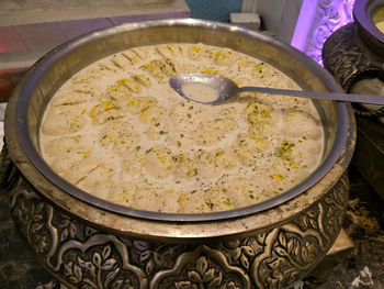 Close-up of hand holding bowl