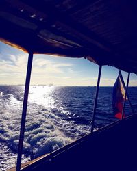 Sailboat sailing in sea against sky