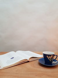 Close-up of coffee cup on table