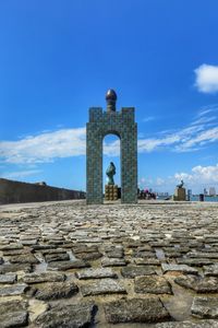 Ancient structure against blue sky