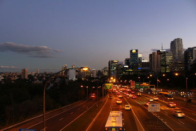 High angle view of illuminated city buildings at night