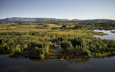 Idyllic scenery of winding river coast in fair weather