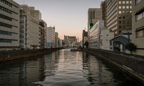 Low angle view of modern buildings against clear sky