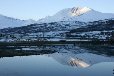 Scenic view of mountains against sky during winter