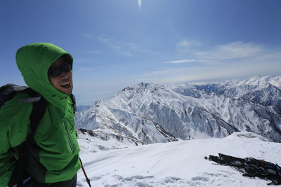 Scenic view of snowcapped mountains against sky during winter