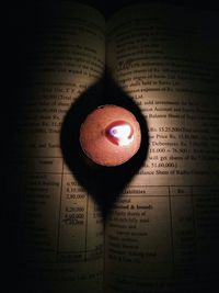 High angle view of heart shape on book