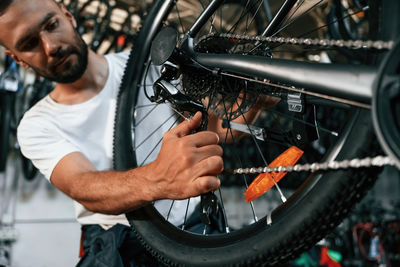 Man repairing motorcycle