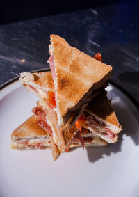Close-up of orange leaf in plate on table
