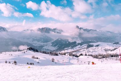 Panoramic shot of ski lift against sky