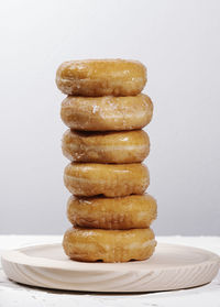 Close-up of cupcakes on table against white background