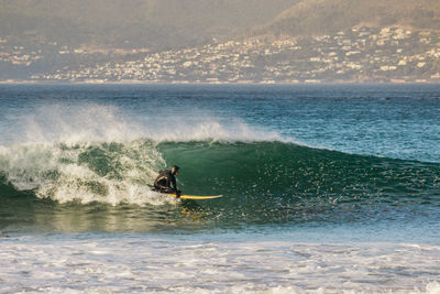 Man surfing in sea