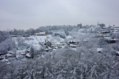 High angle view of snow covered landscape against sky