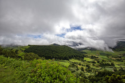 Scenic view of land against sky