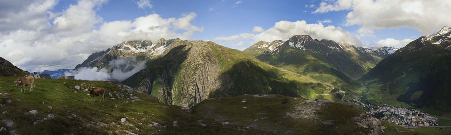 Panoramic view of mountains against sky