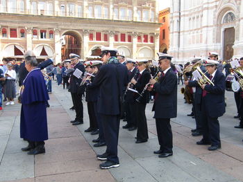 People standing on street in city