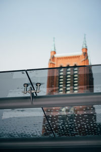 Roof of building against clear sky