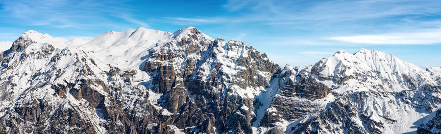Mountain range of monte carega in winter with snow, small dolomites, veneto and trentino, italy.