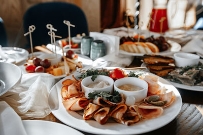 Beautiful served table with appetizers photographed close up