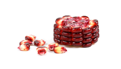 Close-up of fruits against white background