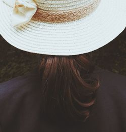 Rear view of woman wearing hat