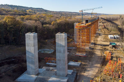 Built structure on landscape against sky