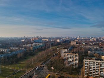 High angle view of buildings in city against sky