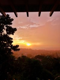 Scenic view of silhouette landscape against sky during sunset