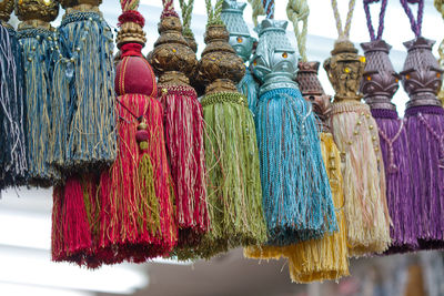Multi colored tassels hanging for sale in market